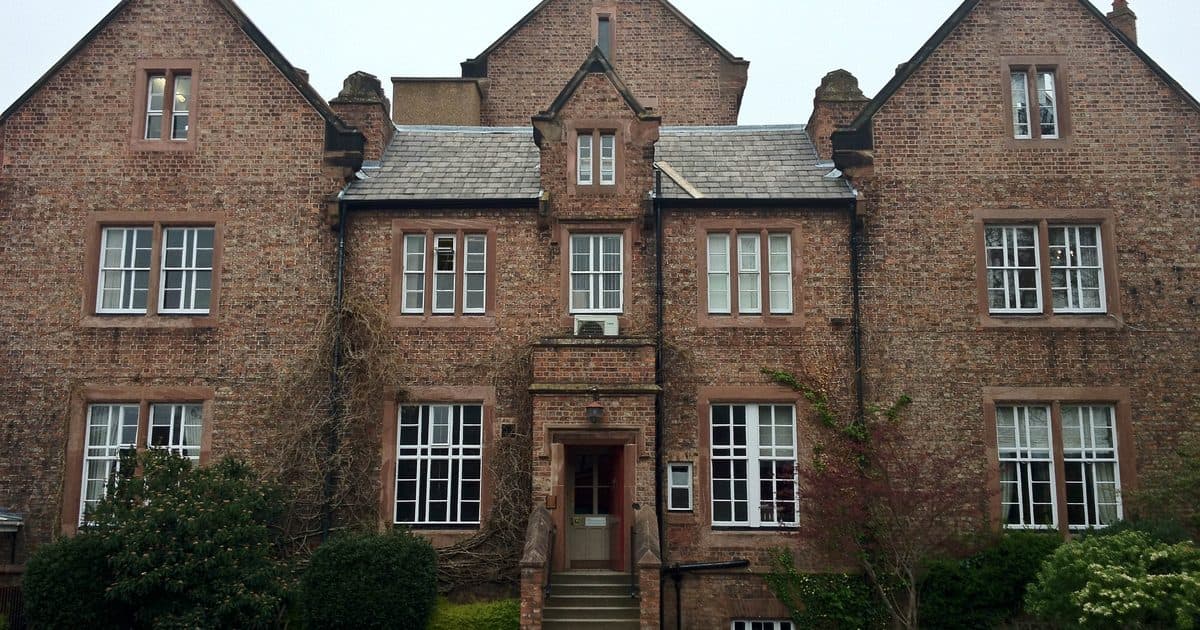 Senate House, a gabled red-brick building on the University of Chester's Parkgate Road campus, Chester